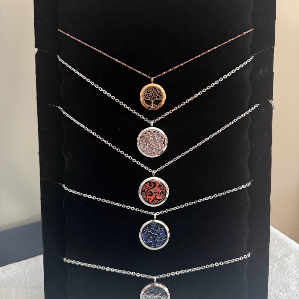 Aromatherapy necklaces in different designs.